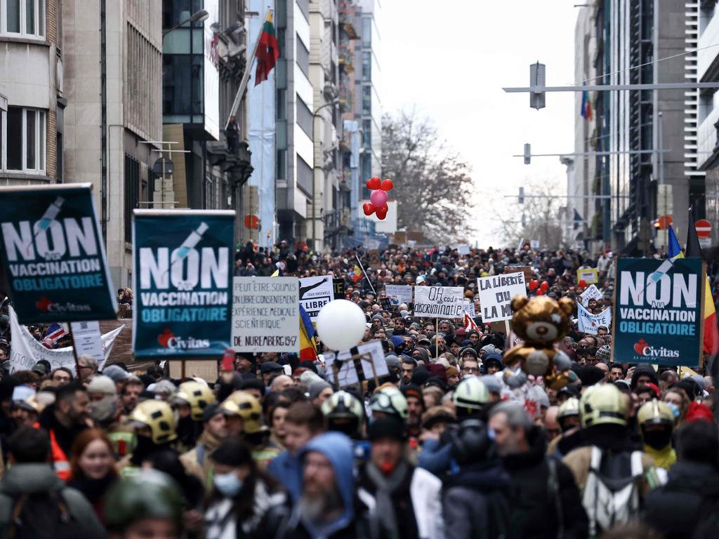 Demonstrators march during a rally against the Belgium government's measures to curb the spread of the Covid-19 and mandatory vaccination in Brussels.