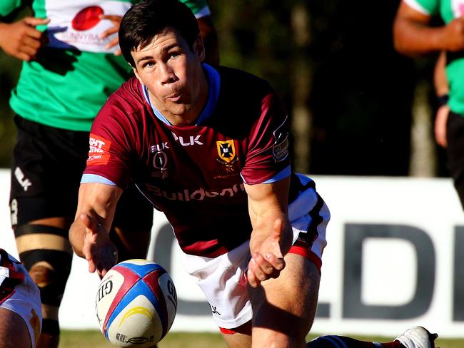 Premier Rugby match: Sunnybank v University of Queensland at Sunnybank. Scott Gale sends a pass for University of Queensland. Picture: Peter Cronin