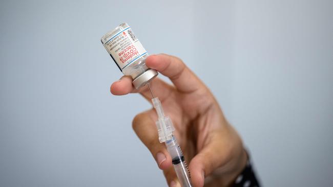 A Moderna Covid-19 vaccine shot is prepared. Picture: Angela Weiss / AFP