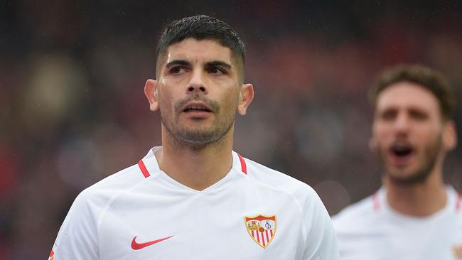 Sevilla's Argentinian midfielder Ever Banega reacts after scoring a goal during the Spanish League football match between Sevilla and Girona at the Ramon Sanchez Pizjuan stadium in Sevilla on December 16, 2018. (Photo by CRISTINA QUICLER / AFP)