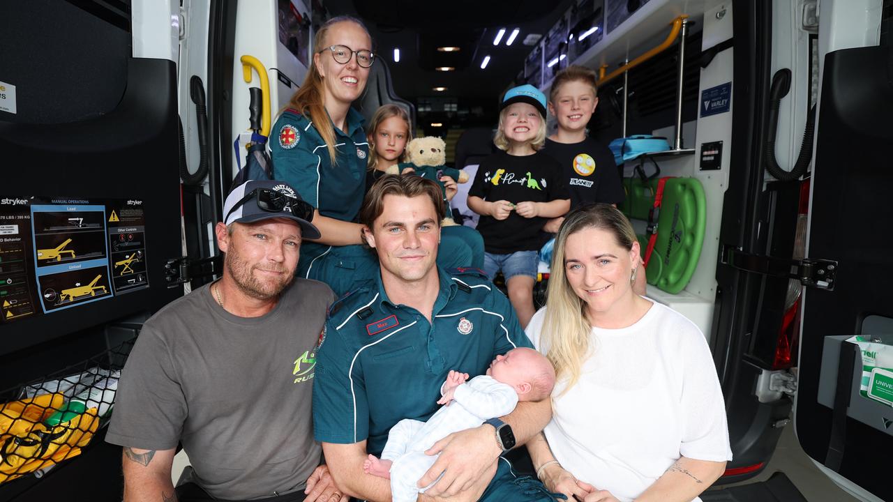 QAS paramedics, Max Westerhof &amp; Brooke Musty meet Mum and dad Natalie and Troy Beecham and baby Cruz Beecham, with Noah 10, Summer 7 and Sonny 4, at Nerang Ambulance Station. Picture: Glenn Hampson