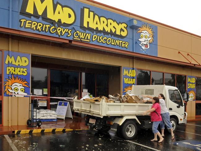 Mad Harrys staff cleanup after their ceiling collapsed during the night causing hundreds of thousands of dollars worth of damage. PHOTO: Barry Skipsey