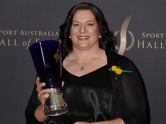 Louise Sauvage poses with her award after receiving Legend status during the Sport Australia Hall of Fame 35th Induction and Awards Gala Dinner at the Palladium at Crown in Melbourne, Thursday, October 10, 2019. (AAP Image/Michael Dodge) NO ARCHIVING