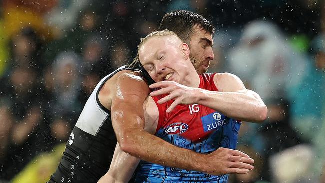 Clayton Oliver battled hard for 30 possessions despite injuring his hamstring during the third quarter of Melbourne’s loss to Port Adelaide. Picture: Sarah Reed / Getty Images