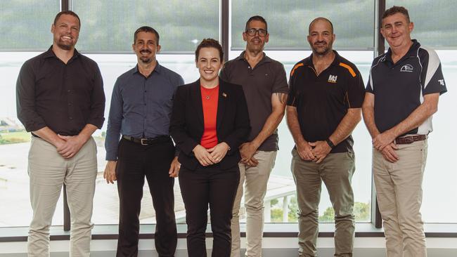 Chief Minister Lia Finocchiaro with five members of the red tape taskforce. From left Hermanus Louw, Dan Richards, Mark Garraway, Michael Buckley and Stuart Kenny. Andrew Dalglish, Tony Smith, and Bec Bullen phoned in.