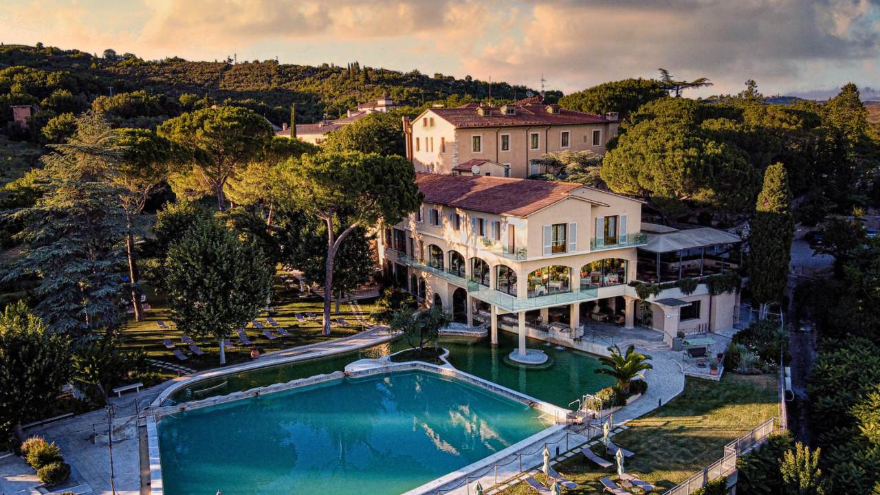 <h3><span>Hotel Posta Marcucci</span></h3><p><strong>&#128205; Tuscany, Italy</strong></p><p><span>With roots in the 19th century, Posta Marcucci (<a href="http://postamarcucci.it" target="_blank" rel="noopener">postamarcucci.it</a>) is a picturesque spa hotel located in the medieval Tuscan village of Bagno Vignoni. Set among rolling hills and&nbsp;</span><span>a sweeping avenue of Cyprus trees, you can check in here for the BeYond Couples Retreat &ndash; a five-day stay designed for those wanting to bring a little dolce back into their love life. </span></p><p><span>While it has all the perks of a luxury wellness retreat &ndash; think yoga classes, spa treatments and serene surroundings &ndash; the program also aims to help partners improve communication and intimacy through transformational coaching sessions and tantric teachings. </span></p><p><span>Being in the land of great food and wine, there&rsquo;s no subsisting on just greens and juices, either. Instead, doses of romance are prescribed in the form of sipping Tuscan reds at sunset, strolling through the town&rsquo;s ancient cobblestone streets, soaking in the spa&rsquo;s thermal pools and long lunches on&nbsp;</span><span>the sun-filled verandah. Bellissima!</span></p>