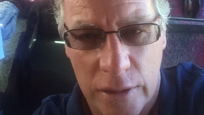 Not happy: Ex-Gold FM radio king Richard Fowler on a bus to Brisbane Airport after Virgin had to cancel its Gold coast to Auckland flight due to "operational issues".