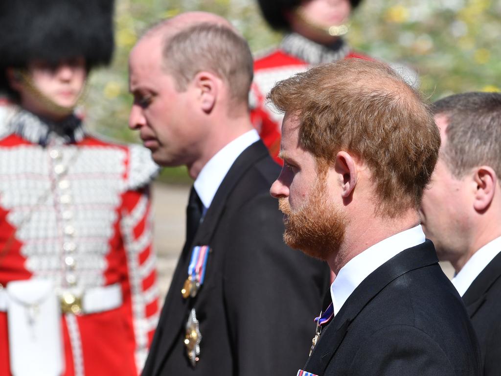 WINDSOR, ENGLAND - APRIL 17: Prince William, Duke of Cambridge; Prince Harry, Duke of Sussex and Peter Phillips walk behind Prince Philip, Duke of Edinburgh's coffin.