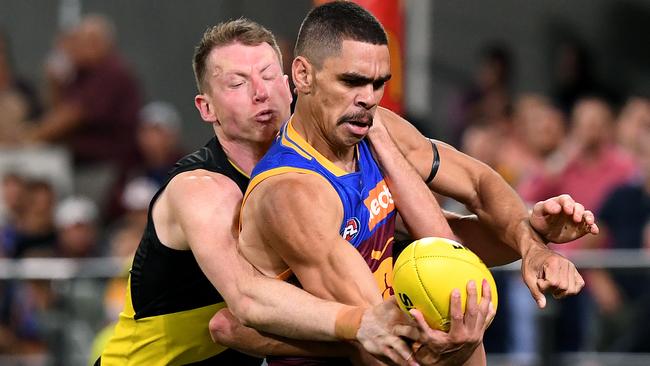 Dylan Grimes puts the clamps on Charlie Cameron during Richmond’s qualifying final triumph.