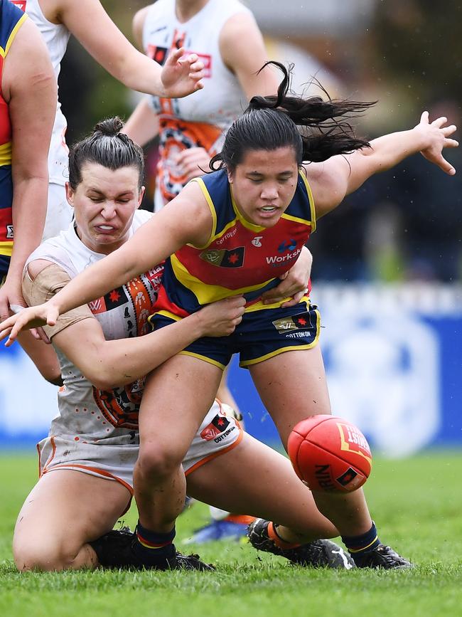 Crows’ Rachelle Martin tackled by Giants’ Alyce Parker. Picture: Getty