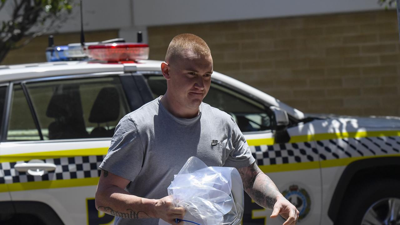 Mason Robbins is seen leaving the Adelaide Magistrates Court.