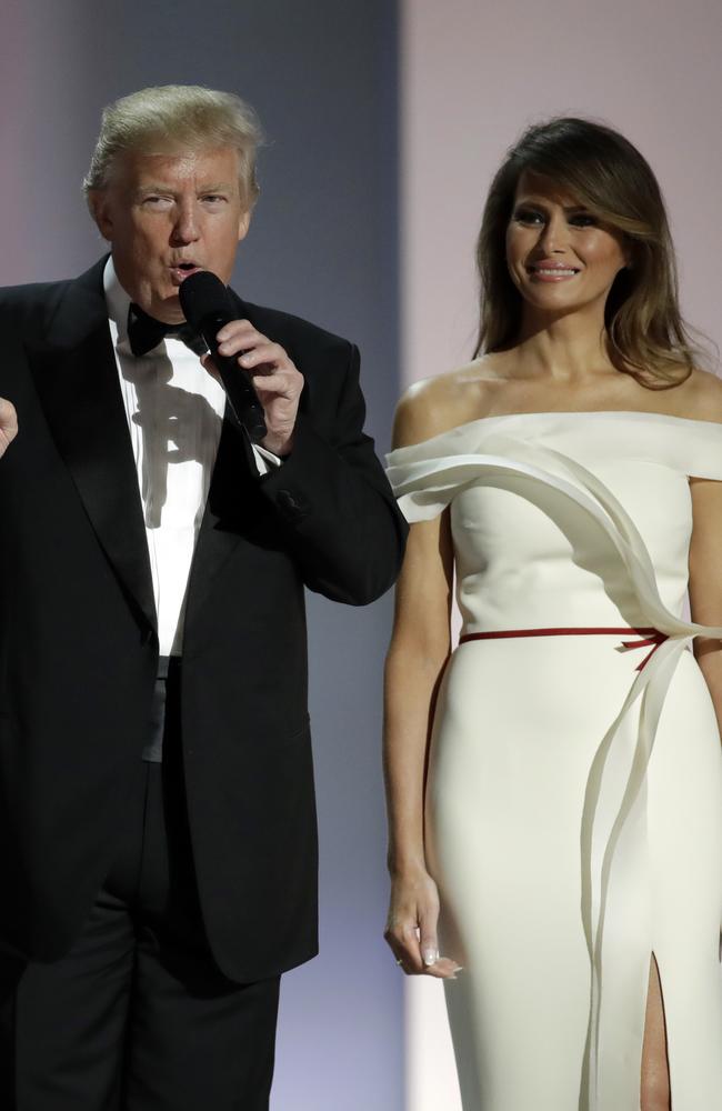 President Donald Trump addresses supporters alongside first lady Melania Trump before dancing at the Liberty Ball.