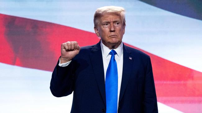 Former US President and Republican presidential hopeful Donald Trump gestures after speaking during the Pray Vote Stand summit at the Omni Shoreham hotel in Washington.