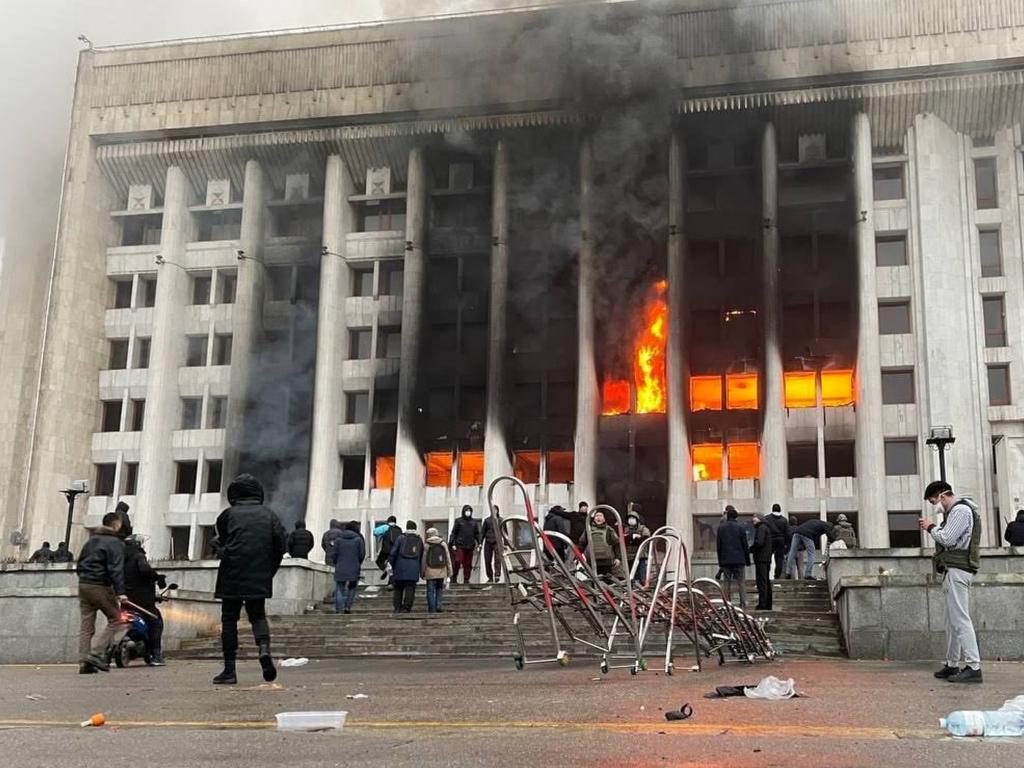 Protesters set fire to the city administration building in Almaty, Kazakhstan.