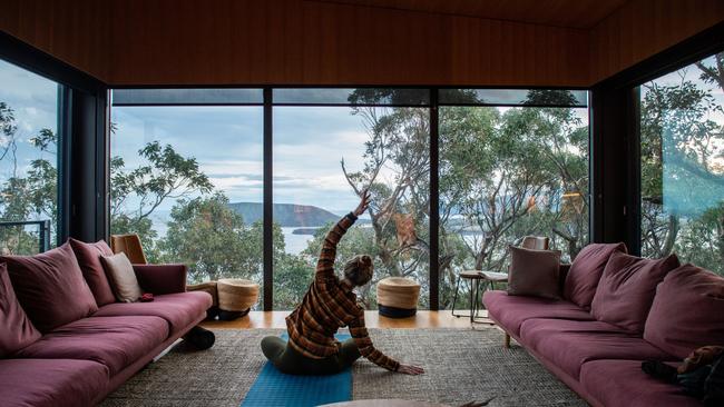 Limbering up in one of the lodges on the Three Capes Track. Picture: Chris Crerar