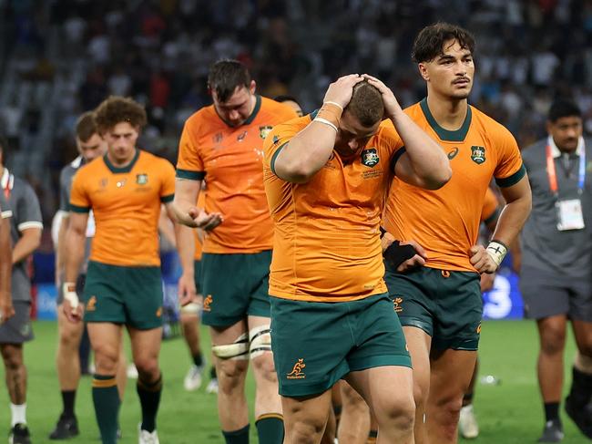 SAINT-ETIENNE, FRANCE - SEPTEMBER 17: A general view as players of Australia look dejected after defeat to Fiji during the Rugby World Cup France 2023 match between Australia and Fiji at Stade Geoffroy-Guichard on September 17, 2023 in Saint-Etienne, France. (Photo by Catherine Ivill/Getty Images)