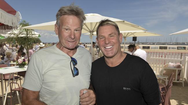 Sam Newman and Shane Warne attend Twilight Beach Polo in St Kilda weeks before Warne’s death. Picture: Sam Tabone