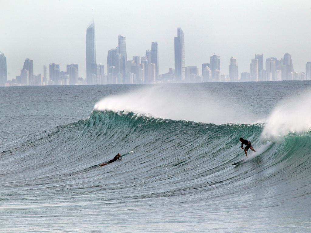 Surfers pictured enjoying good swell and near perfect waves at Snapper Rocks. Picture: Mike Batterham