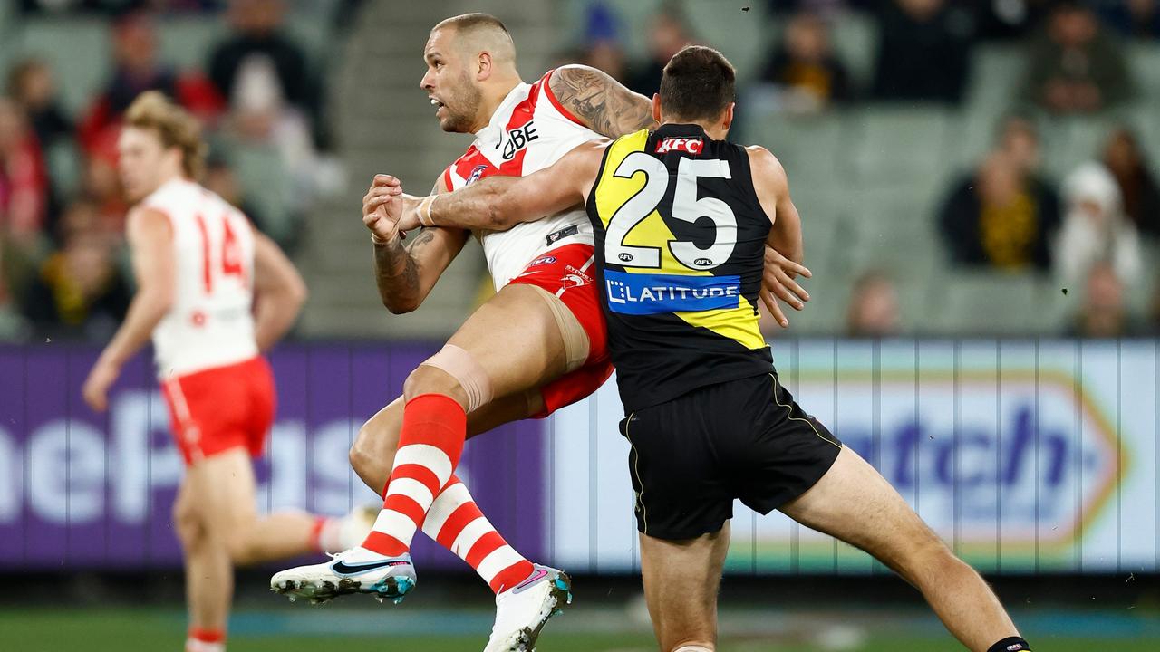 Lance Franklin is nailed by Toby Nankervis. Picture: Michael Willson/AFL Photos via Getty Images