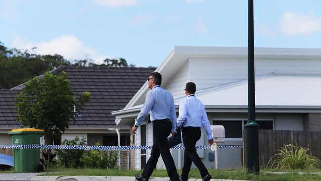 Police at a crime scene on the northern Gold Coast. Pic Tim Marsden