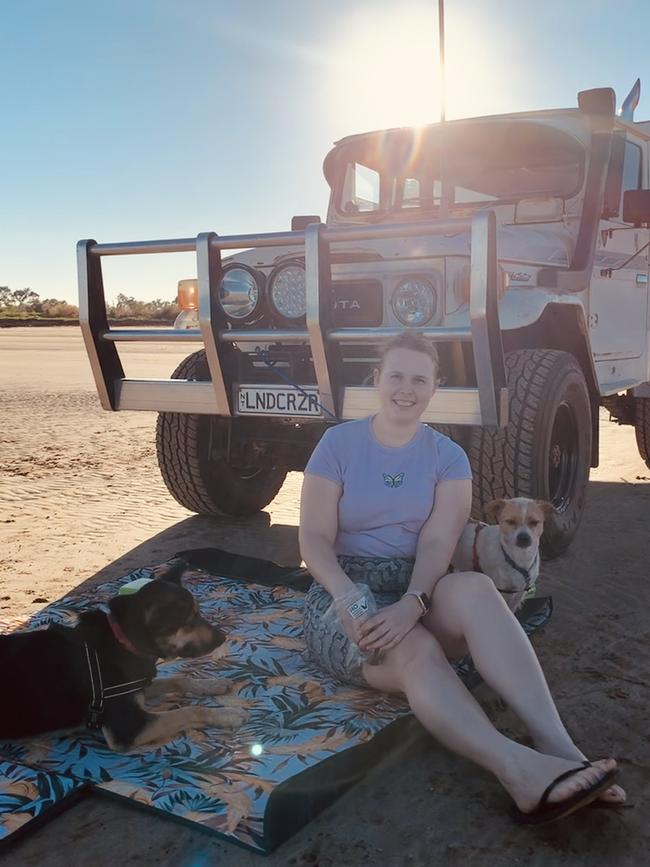 Polly the Kelpie, Michaela the human and Rusty the Jack Russe with the iconic 4x4. Picture: Mitch Halse
