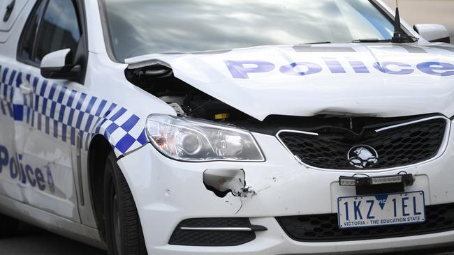 Five police cars are damaged after two separate crashes overnight. File image