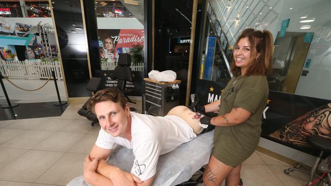 Gorringe at Celebrity Ink at Surfers Paradise after losing a bet. Photo: Richard Gosling