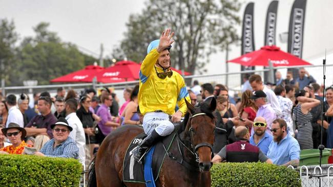 City Of Ipswich Eye Liner Stakes winning jockey Blake Shinn acknowledges the big crowd at Ipswich. Picture: Rob Williams