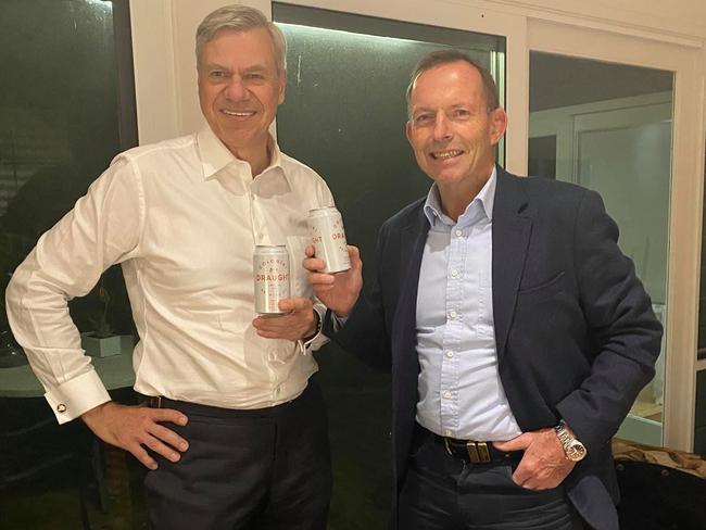 Wild Colonial boys Michael Kruger and Tony Abbott share an ale. Picture: Supplied