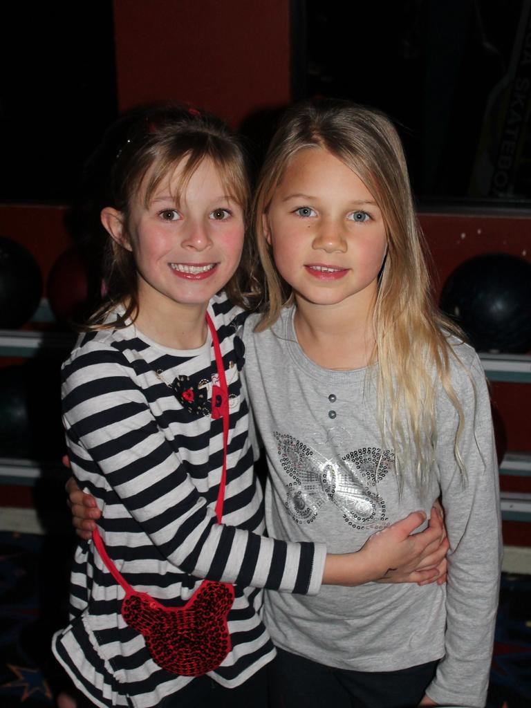 FREINDS: Caitlyn Hennoste and Eliza Telfer make the Blue Light Disco a girls night. Photo Linden Morris / Stanthorpe Border Post