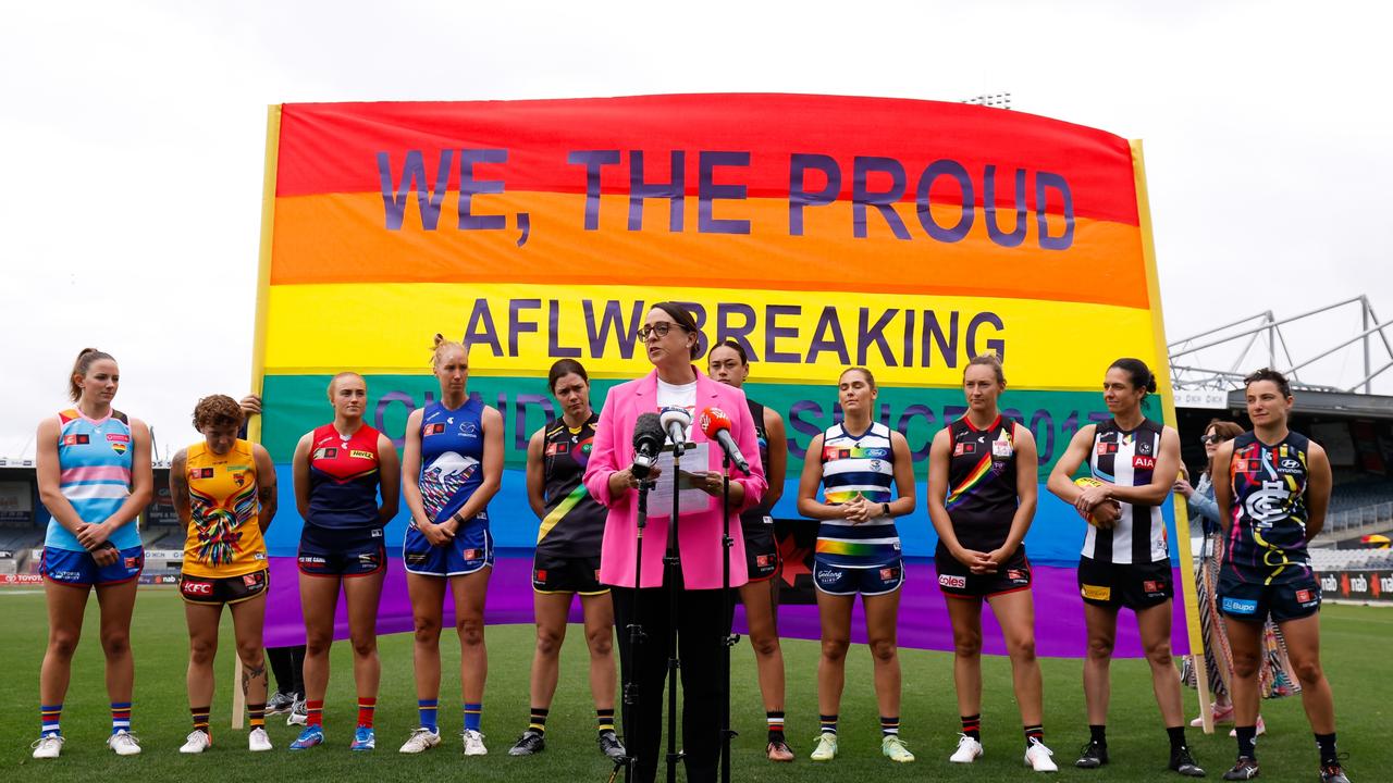 AFLW general manager Nicole Livingstone with players from the 10 Victorian clubs ahead of the league’s fourth Pride Round this weekend. Picture: Dylan Burns / Getty Images