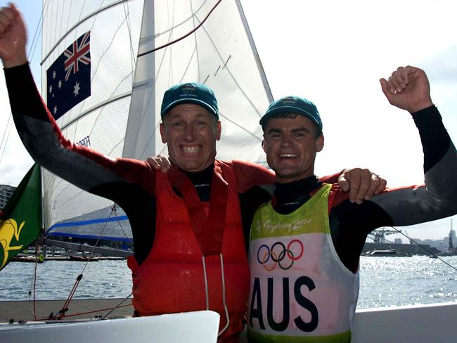 Aust yachtsman John Forbes (left) with Darren Bundock celebrating winning the silver medal in the Tornados sailing event at the Olympic Games in Sydney 2000. Picture: Bruce Long