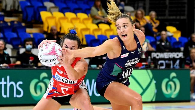 Maddy Proud of the Swifts and Liz Watson of the Vixens challenge for the ball. Picture: Bradley Kanaris/Getty Images