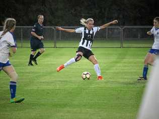 CUP WIN: Willowburn's Ebonney Brooke sends the ball downfield during his side's 8-2 Tom McVeigh Cup final win over Rockville. Picture: Clayton Menyweather/FQSW