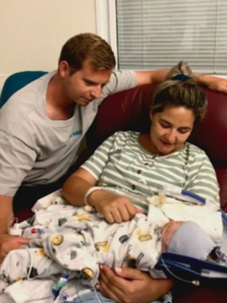 Andre, Jenna, and Hugo McGregor at Mackay Base Hospital. Photo: 9News