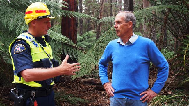 Dr Bob Brown, right, talks to a Tasmania Police officer before being arrested at Lapoinya in Tasmania’s North-West. n in the Lapoinya Coupe. Picture: BOB BROWN FOUNDATION