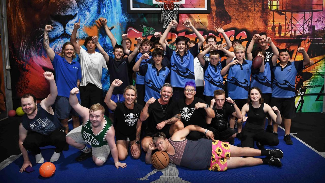 Leon Stensholm (centre) founder and director of Lookout 07 with some of the volunteers and youths. Picture: Patrick Woods.