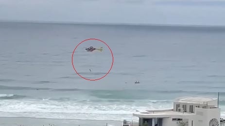 A rescue chopper at Surfers Paradise. Picture: Christine Tibbitts