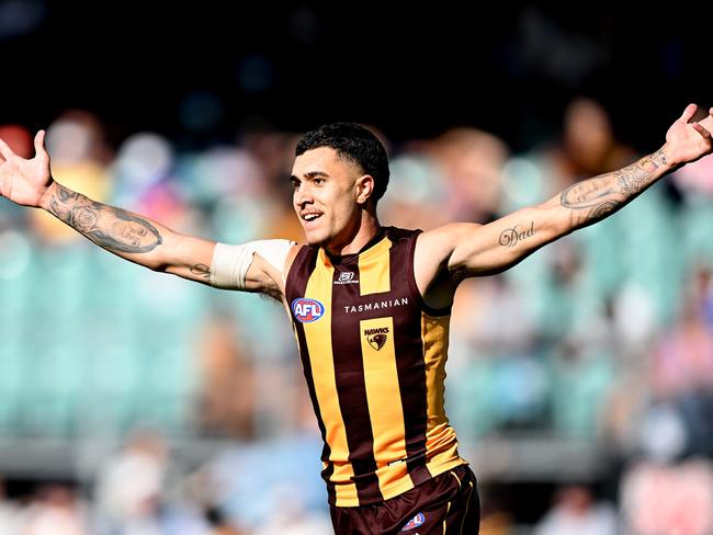 LAUNCESTON, AUSTRALIA - APRIL 01: Tyler Brockman of the Hawks celebrates a goal during the round three AFL match between Hawthorn Hawks and North Melbourne Kangaroos at University of Tasmania Stadium, on April 01, 2023, in Launceston, Australia. (Photo by Steve Bell/Getty Images)