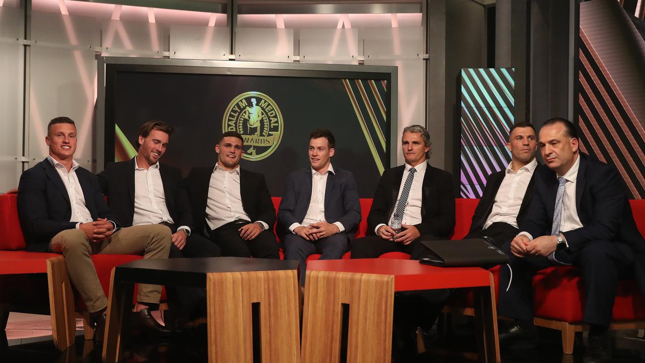 Canberra's Jack Wighton, Parramatta's Clint Gutherson, Penrith's Nathan Cleary, Roosters Luke Keary, Penrith coach Ivan Cleary, Roosters James Tedesco and Peter V'landys relax before the 2020 Dally M Awards at Fox Sports studio