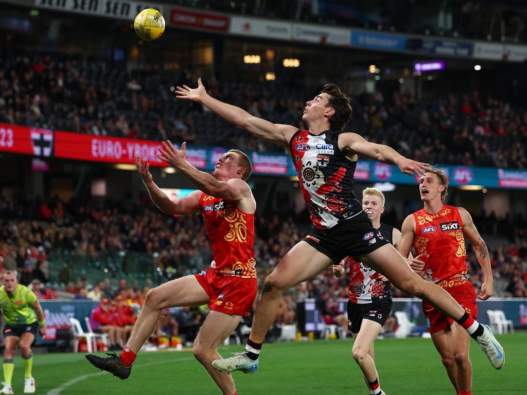 Hugh Boxshall (right) flies for the ball with Matt Rowell. Picture: Morgan Hancock/Getty Images