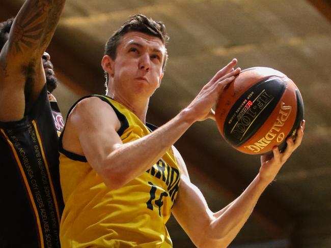 Woodville Warriors Brodie Nathan getting to the basket. Picture: Rod Patterson