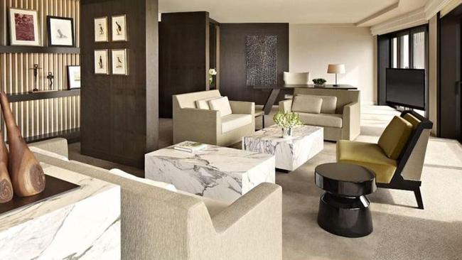 The Opera suite, pictured, is decorated in taupe, warn chocolate brown and marble. Picture: Park Hyatt