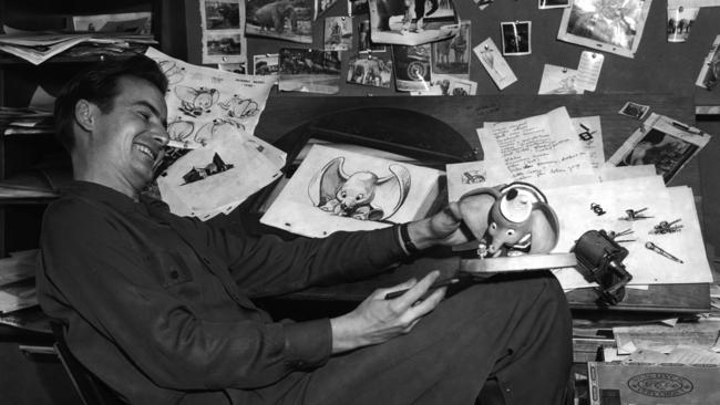 History: Artist Bill Peet working on the Disney film Dumbo in 1941. Out of copyright.