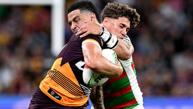 Broncos fullback Reece Walsh is tackled by Cody Walker. Picture: Getty Images