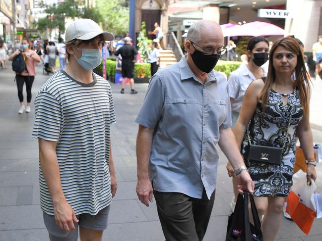 Some shoppers in Pitt St Mall are donning masks when others are not as NSW residents have eased restrictions despite very high Covid-19 numbers. Picture: NCA NewsWire/Simon Bullard