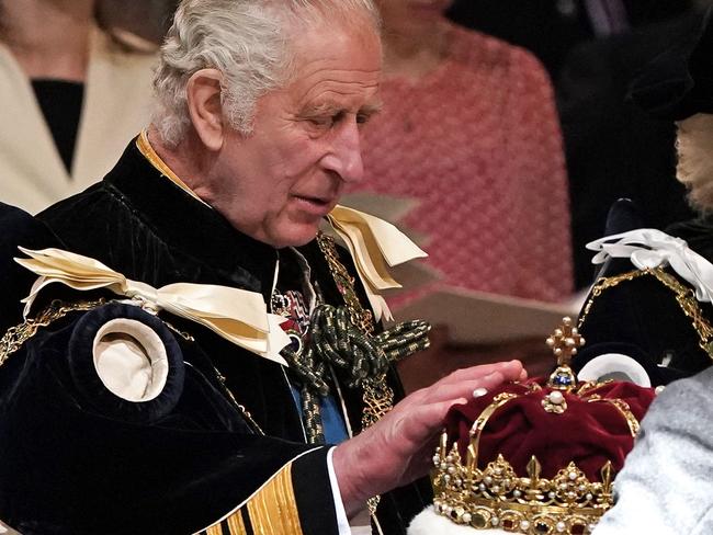 King Charles is presented with the Crown of Scotland, part of the Honours of Scotland, during a National Service of Thanksgiving in Edinburgh. Picture: AFP