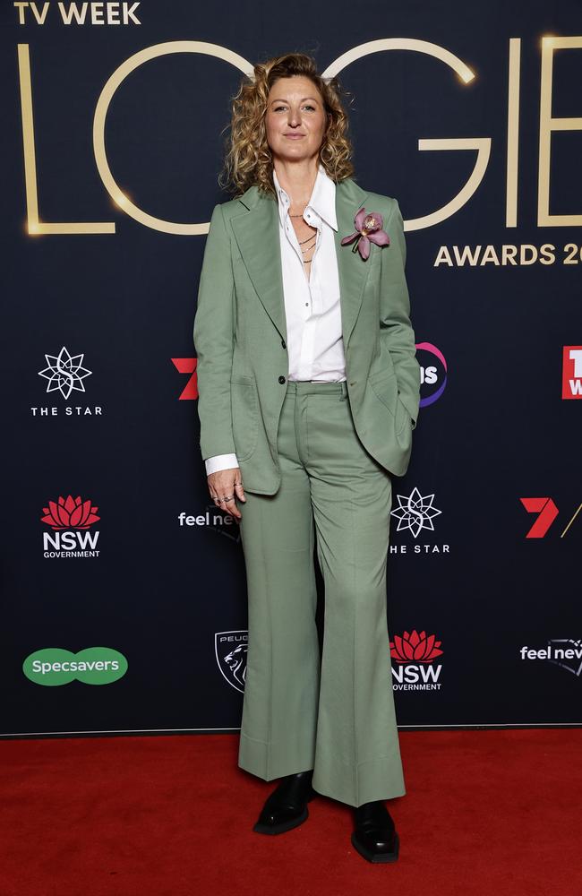 Kate Box wore a Sicilian-olive green 1970s men’s suit with vintage Thierry Mugler white shirt and Christian Dior necklace. Picture: Sam Tabone/Getty Images