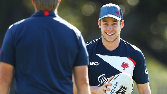 Luke Keary shares a joke with Roosters coach Trent Robinson.