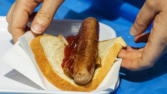 SYDNEY, AUSTRALIA - NewsWire Photos OCTOBER 11, 2020: A sausage sandwich is seen at Bunnings Alexandria where itÃs sausage sizzle has resumed after COVID-19 restrictions. Picture: NCA NewsWire / Jenny Evans